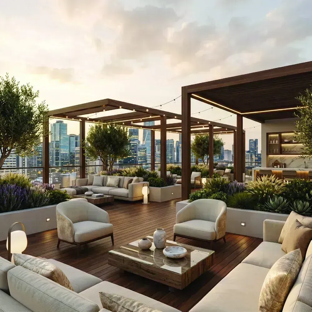 Rooftop party terrace with pergolas, planting and lounge seating at dusk